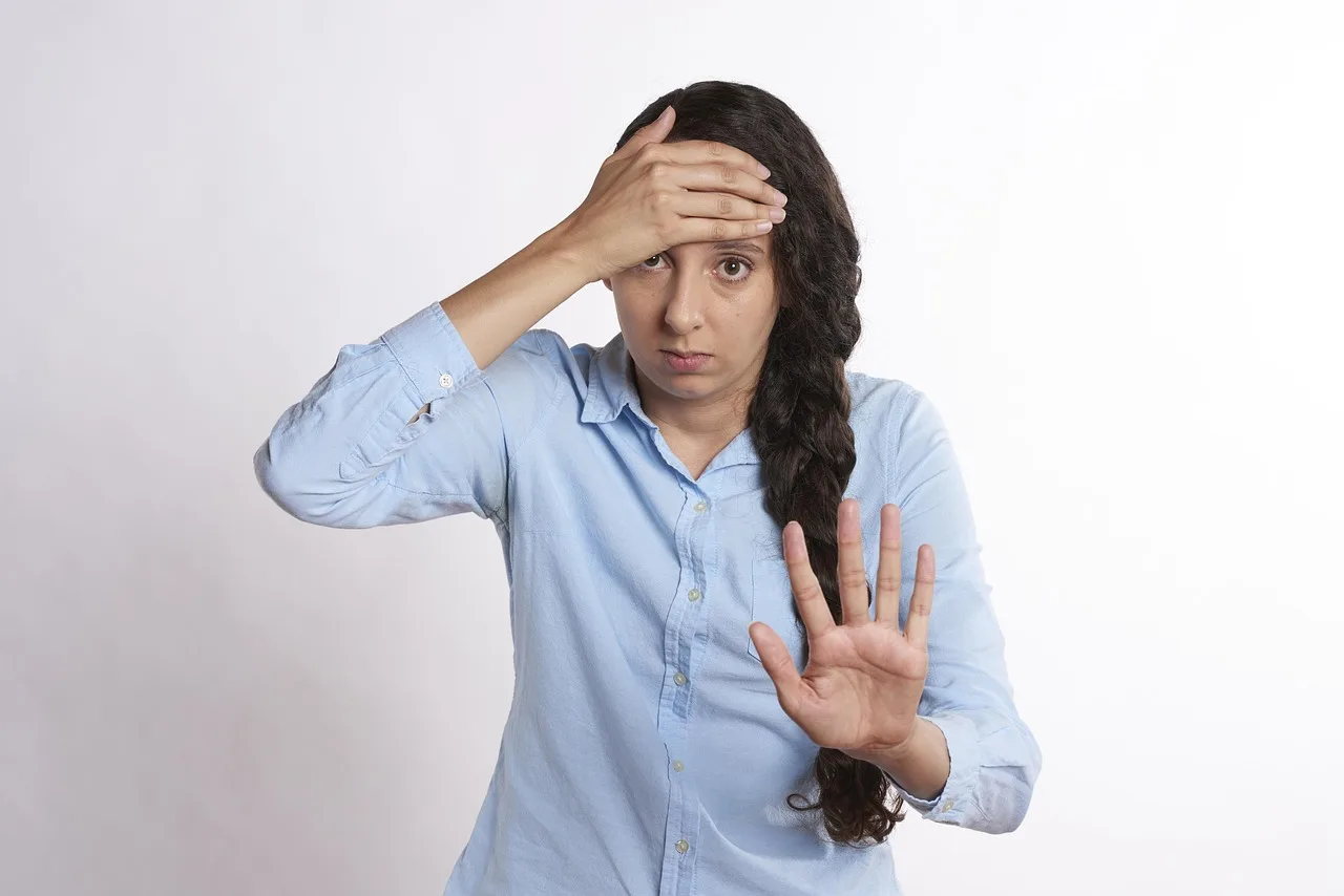 frustrated-football-fan-watching-TV-with-hands-on-head-2